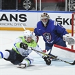 PARIS, FRANCE - MAY 15: Slovenia's Ales Music #16 is tripped by France's Jonathan Janil #3 (not shown) and crashes into Cristobal Huet #39 resulting in a penalty shot during preliminary round action at the 2017 IIHF Ice Hockey World Championship. (Photo by Matt Zambonin/HHOF-IIHF Images)


